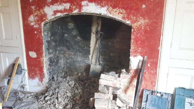 The old fireplace was full of rubble and had been bricked up in the 1920's.