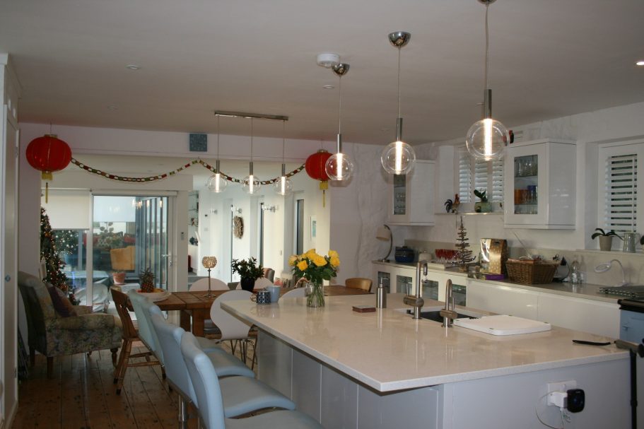 The view of the corridor from the kitchen. The view of the corridor from the kitchen.