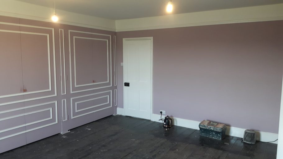 The room is painted to match the wardrobe. The room is painted to match the wardrobe.