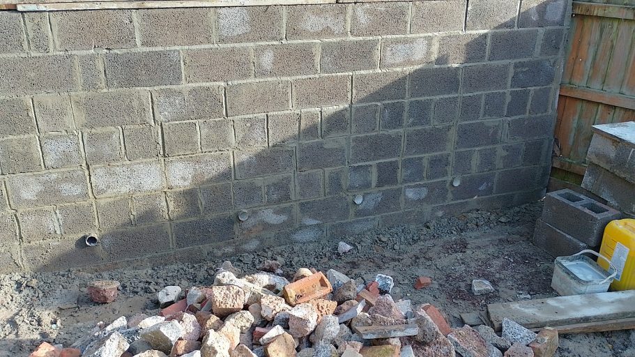 The reinforcing process is repeated as the wall gains height. The reinforcing process is repeated as the wall gains height.