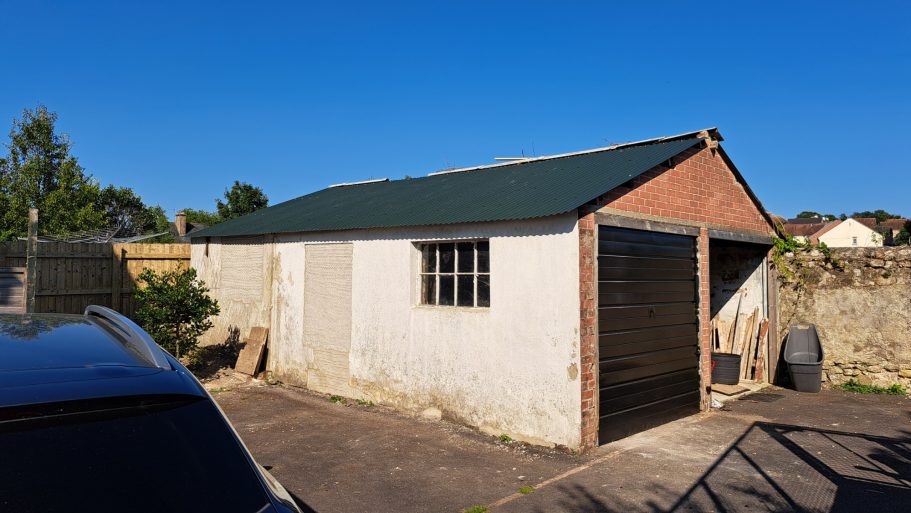 External view of garage new metal roof fitted. External view of garage new metal roof fitted.