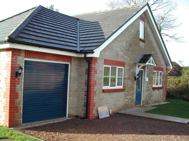Bungalow with garage attached to the side solid block & beam construction with loft conversions. Detached. 