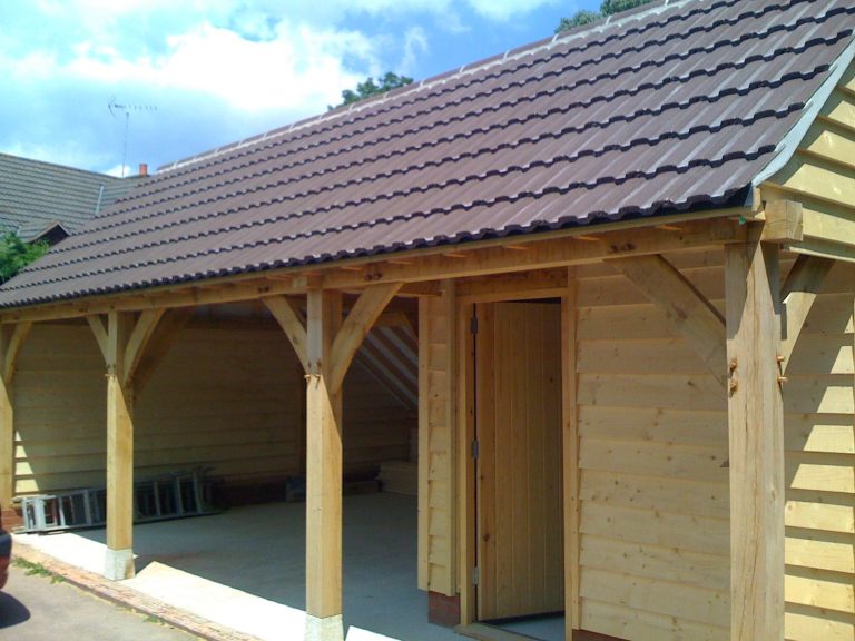 Custom built shed made from oak, pottery suite garage craft room garden room tiled roof