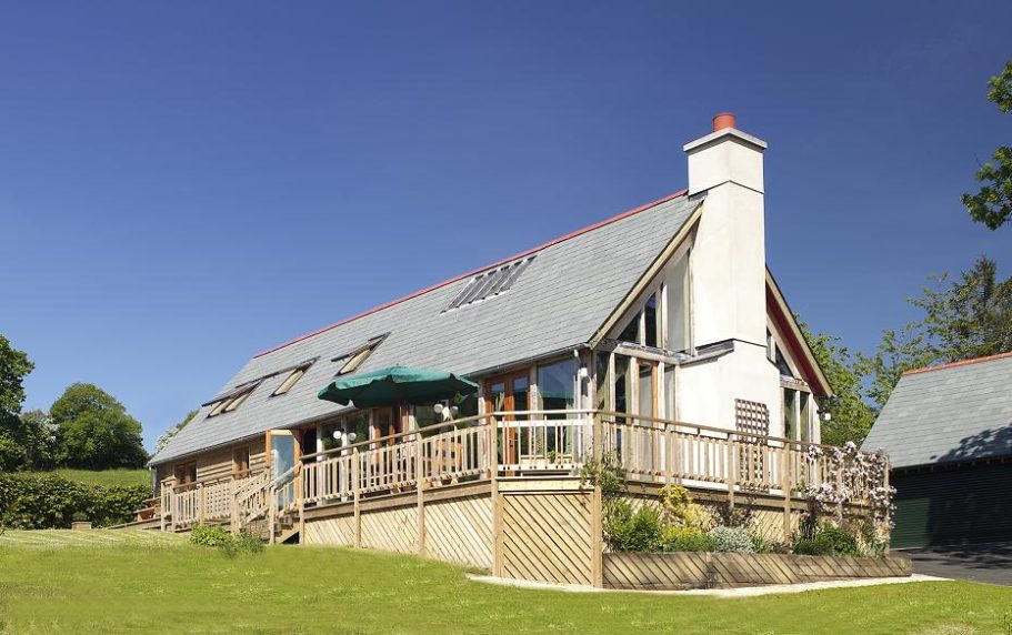 External view of award winning green oak timber framed house. External view of award winning green oak timber framed house.