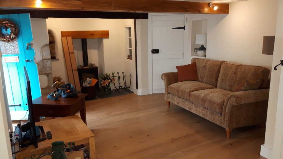 The finished floors were engineered oak planks, resistant to shrinking or expansion. The finished floors were engineered oak planks, resistant to shrinking or expansion.