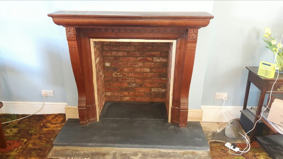 We reused the old timber mantle piece and added bricks to match the other fireplace. We reused the old timber mantle piece and added bricks to match the other fireplace.