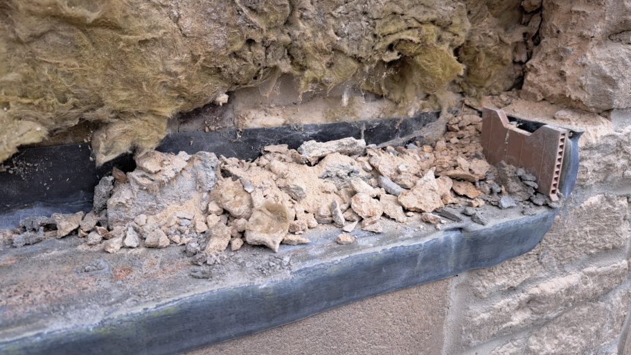 3: Removal of stonework shows 3 issues. A lead tray filled with rubble and mortar snots. 3: Removal of stonework shows 3 issues. A lead tray filled with rubble and mortar snots.