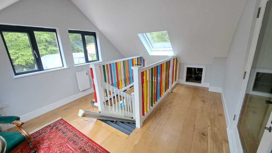 Rainbow staircase handrail spindles, steel stairs and stair lift.. Rainbow staircase handrail spindles.