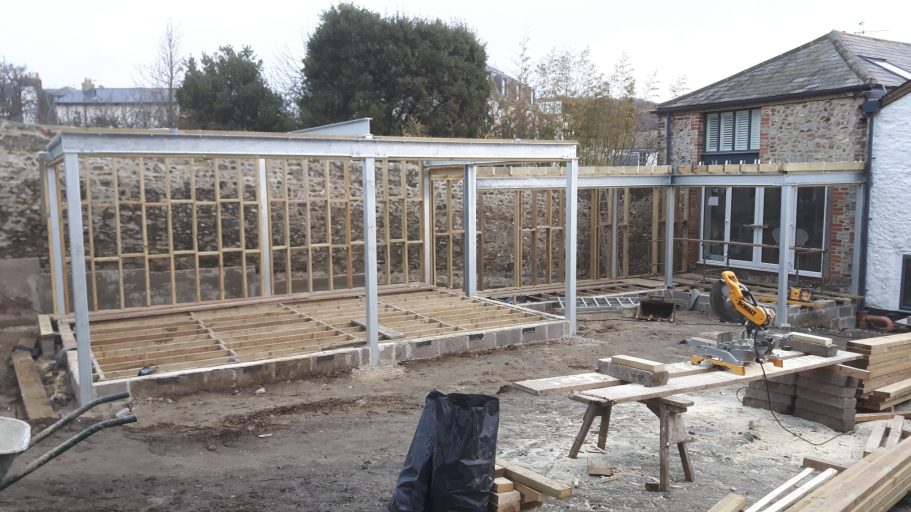 Floor was added and sits on sleeper walls, air is allowed to circulate beneath the floor. Floor was added and sits on sleeper walls, air is allowed to circulate beneath the floor.