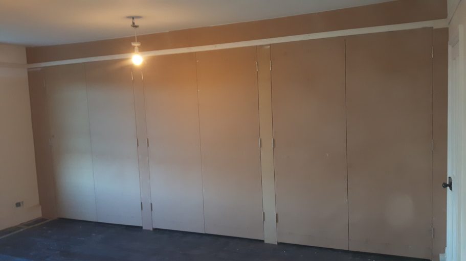 A timber frame was built then clad with 18mm MDF to form the doors. A timber frame was built then clad with 18mm MDF to form the doors.