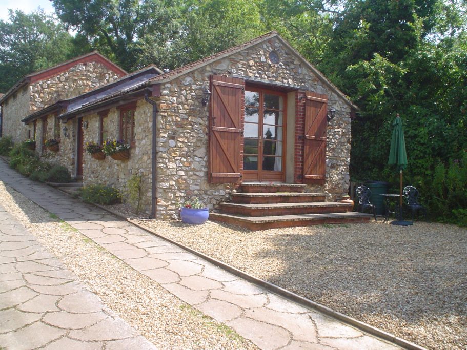 Flint barn conversion from former stables. Flint barn conversion from former stables.