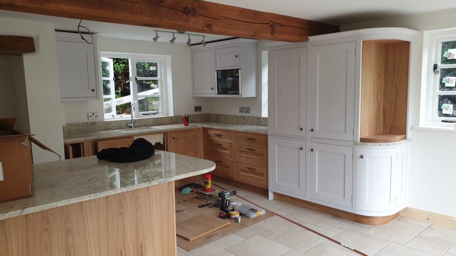 Once the beams are installed, the new kitchen and tiled floors are installed. Once the beams are installed, the new kitchen and tiled floors are installed.